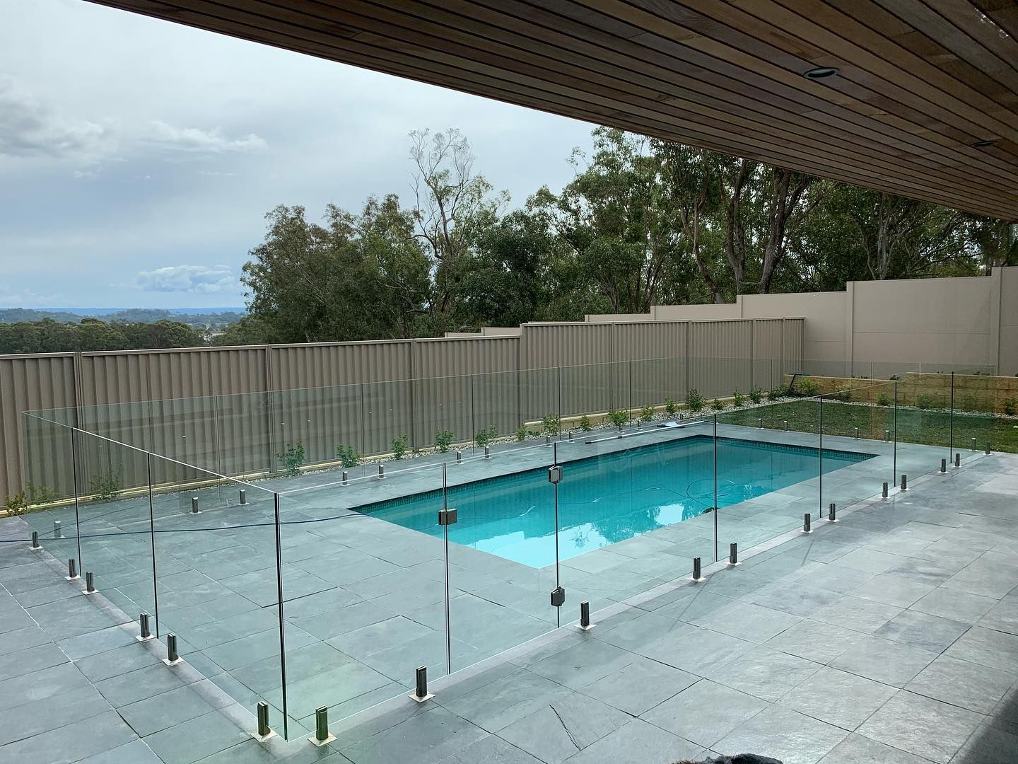 A Large Swimming Pool — All Glass Balustrading Systems in Wetherill Park, NSW