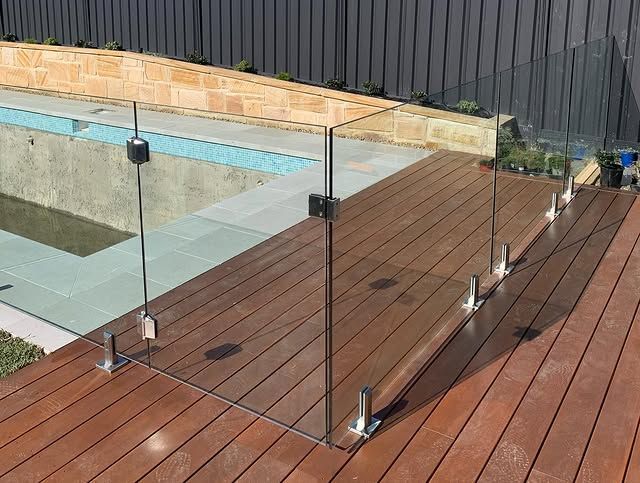 Outdoor Pool With Glass Safety Fence — All Glass Balustrading Systems in Wetherill Park, NSW