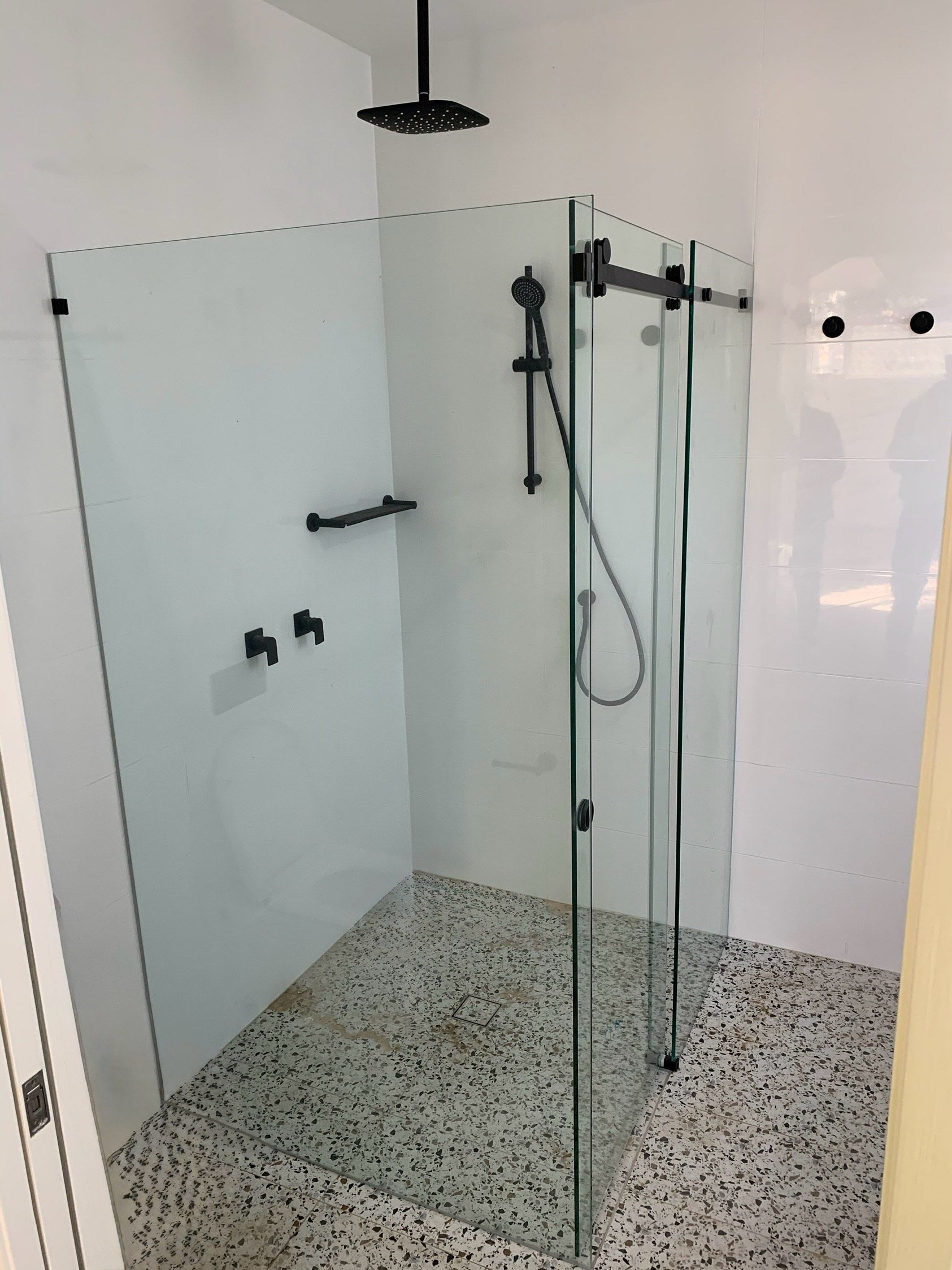 Modern Shower With Glass Walls, Black Fixtures — All Glass Balustrading Systems in Wetherill Park, NSW