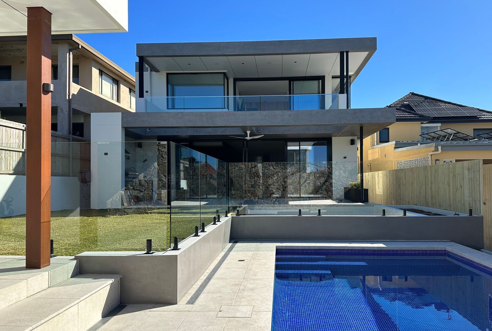 Modern Two-story House With Pool — All Glass Balustrading Systems in Wetherill Park, NSW