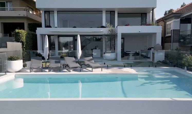 Swimming Pool Area With a Glass Fence, Outdoor Structure — All Glass Balustrading Systems in Wetherill Park, NSW