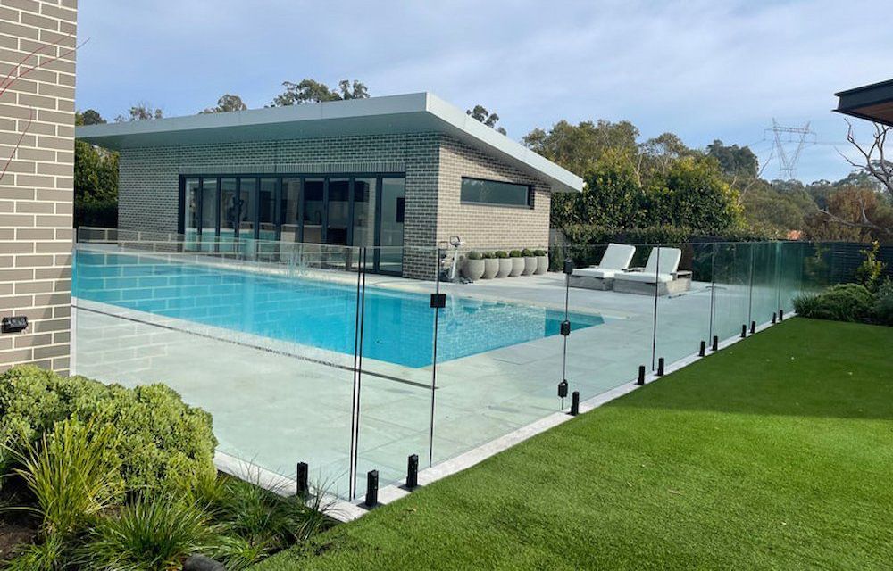 Pool Area With Glass Fence — All Glass Balustrading Systems in Wetherill Park, NSW