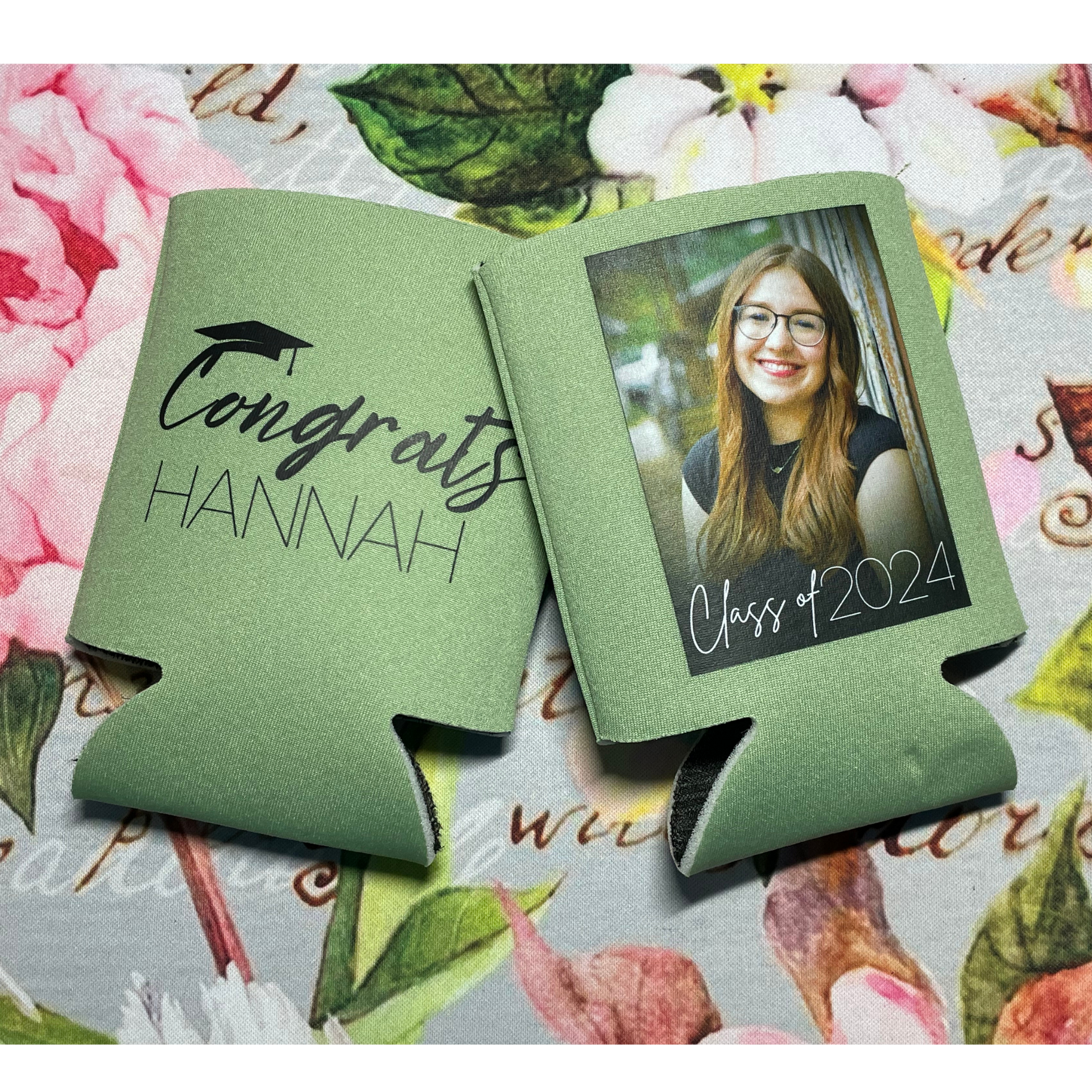 Green graduation card with “Congrats Hannah” and a smiling photo on a floral background