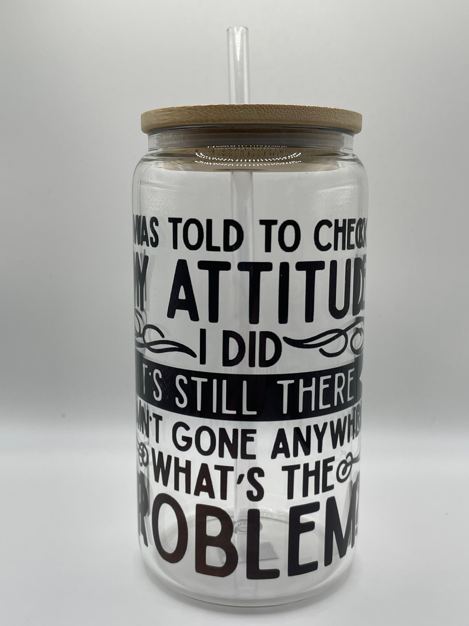 Glass jar candle with a cork top and bold black motivational text on white labels.