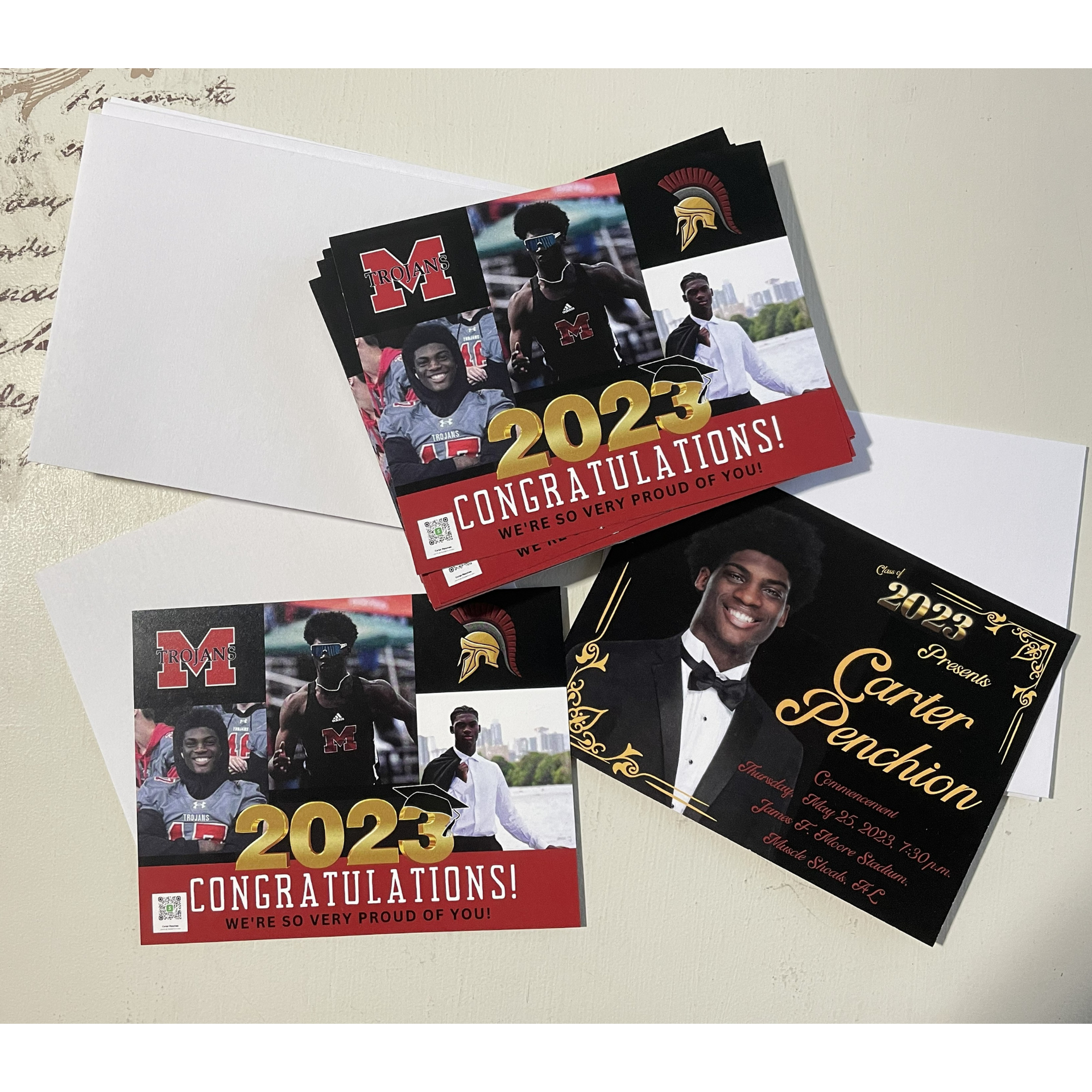 Graduation announcement cards with red and black design, “2024 Congratulations!” and a cap-and-gown portrait