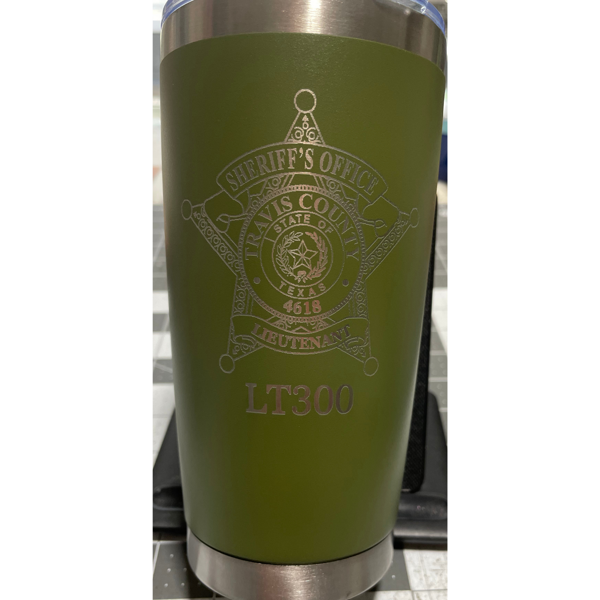 Olive-green tumbler with a Sheriff’s Office badge design and “LT300” on the front.