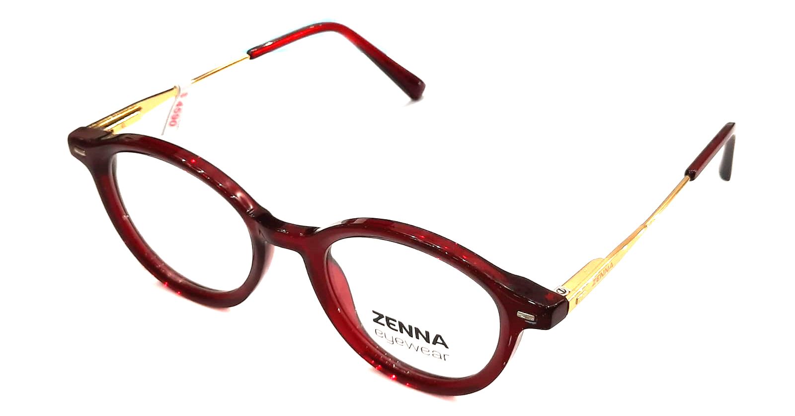 Un par de gafas rojas con borde dorado sobre un fondo blanco.