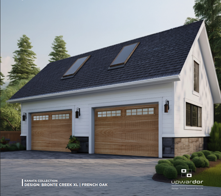 Modern white house with two wooden garage doors, dark shingled roof, and skylights
