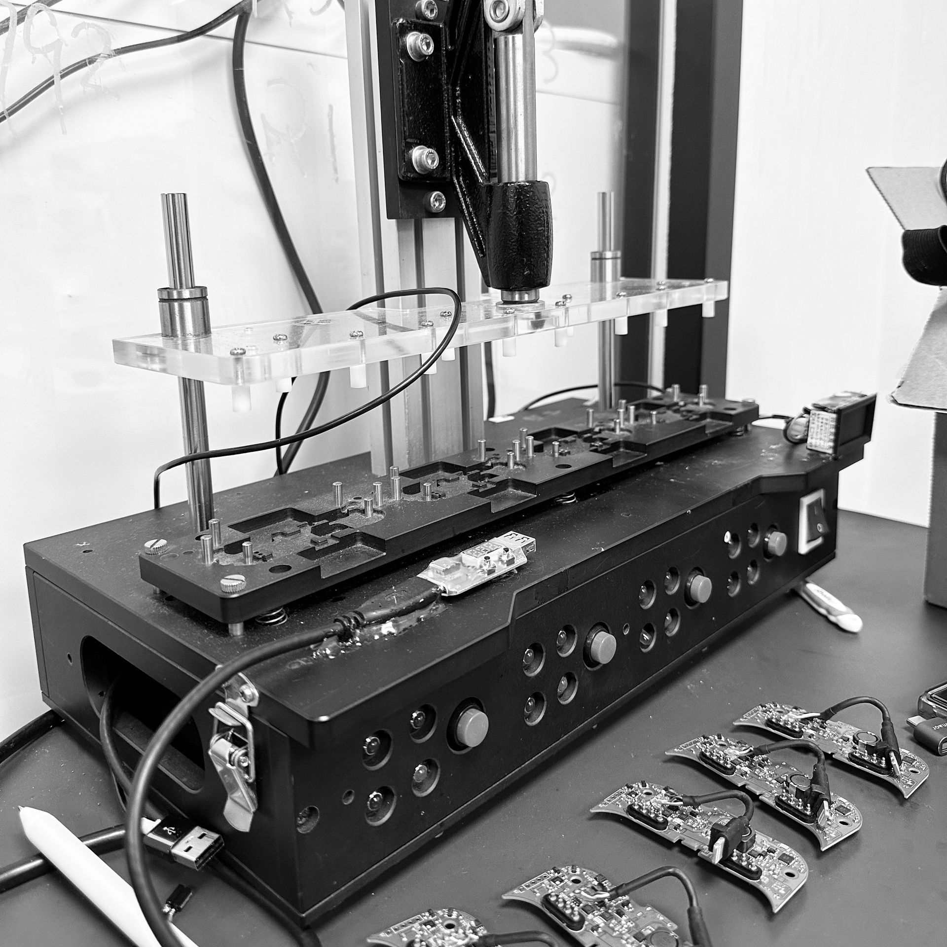 A black and white photo of a machine on a table
