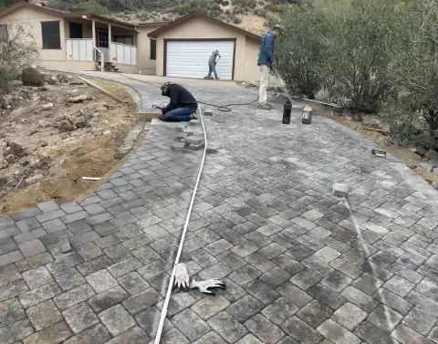 Custom driveway installation improving access and functionality around a property