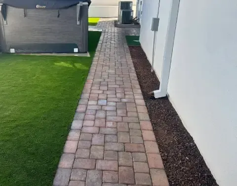 Custom walkway installation complementing the surrounding landscape design