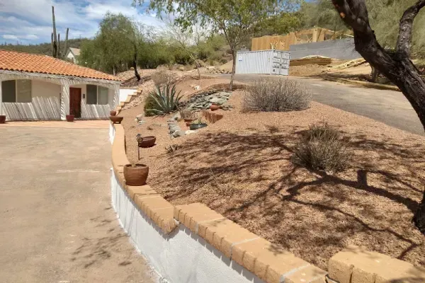 Defensible space landscaping reducing vegetation around a residential property
