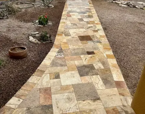 Front yard walkway installation creating an inviting path to the home
