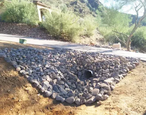Landscape water management solution improving drainage across an outdoor space