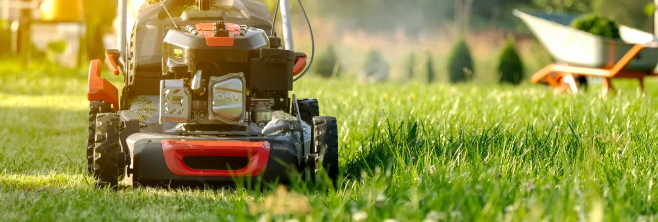Professional lawn mowing service maintaining a neat residential yard