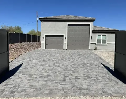 New driveway installation creating a defined access area for a home