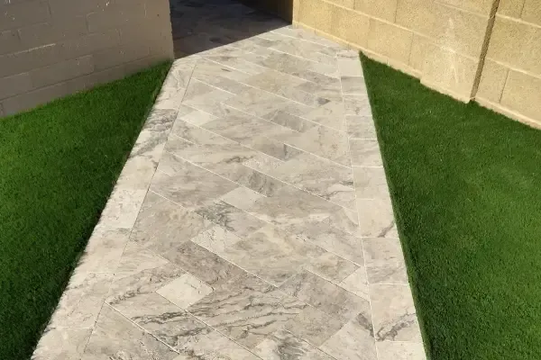 Residential walkway installation connecting outdoor areas around the home