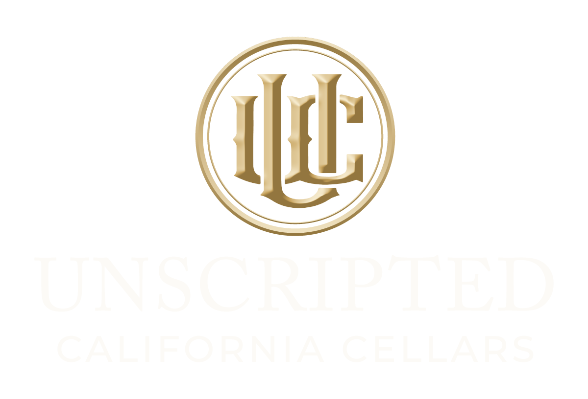 Gold circular logo with “UC” above faint text “Unscripted Cellars” on a white background
