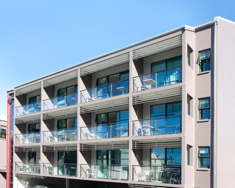 A large building with lots of windows and balconies