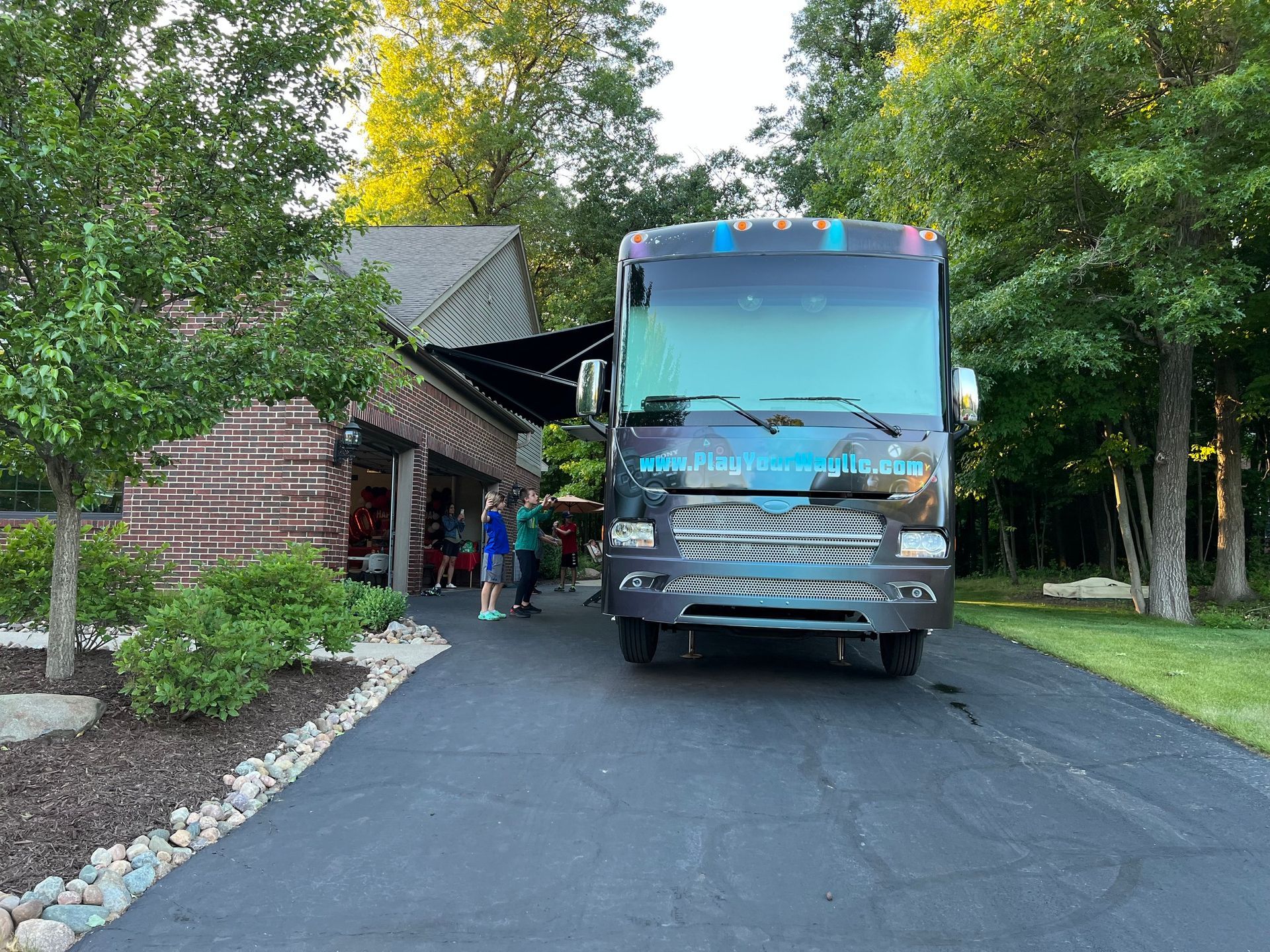 play your way bus parked in the driveway