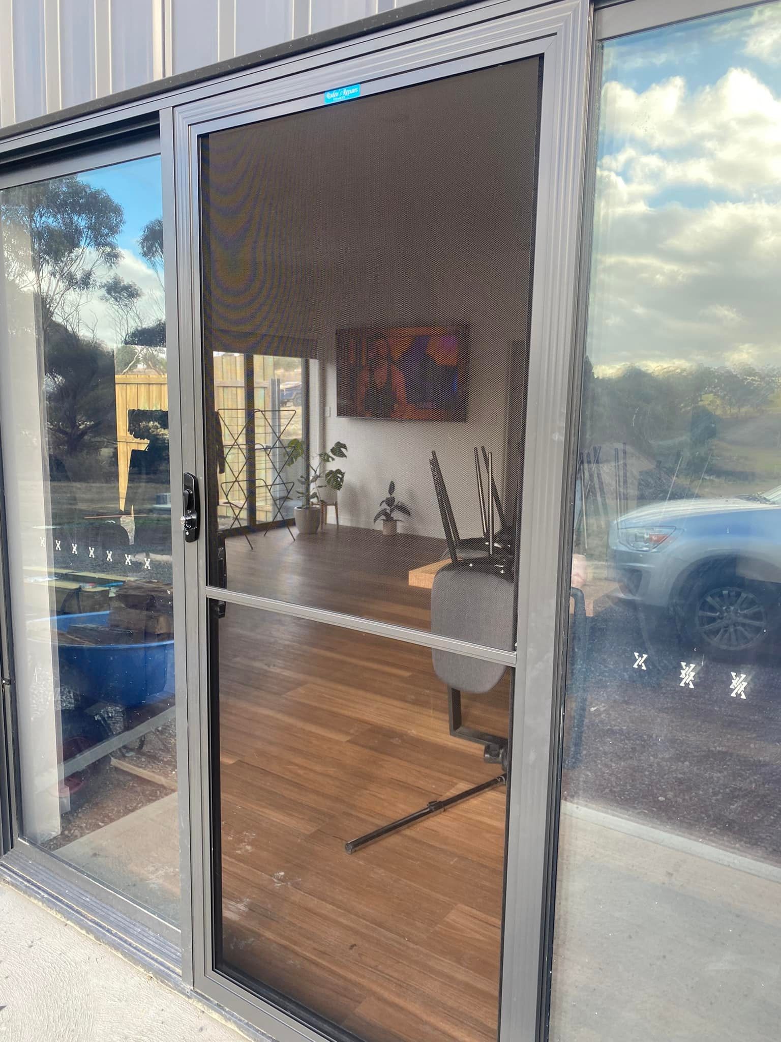 A Silver-framed Sliding Screen Door — Rodens Repairs Flyscreens and Doors In Sorell, TAS