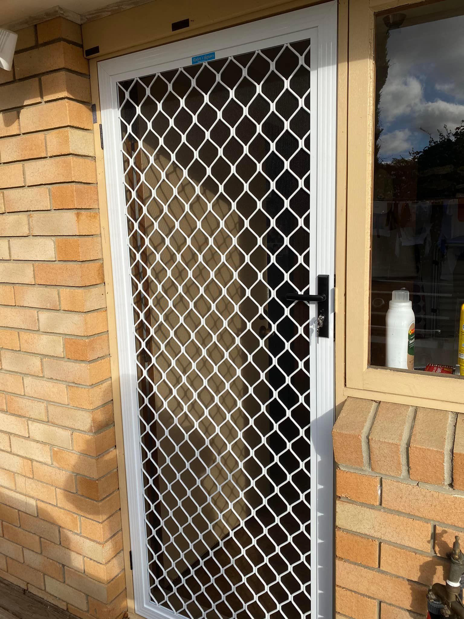 A White Security Screen Door — Rodens Repairs Flyscreens and Doors In Sorell, TAS