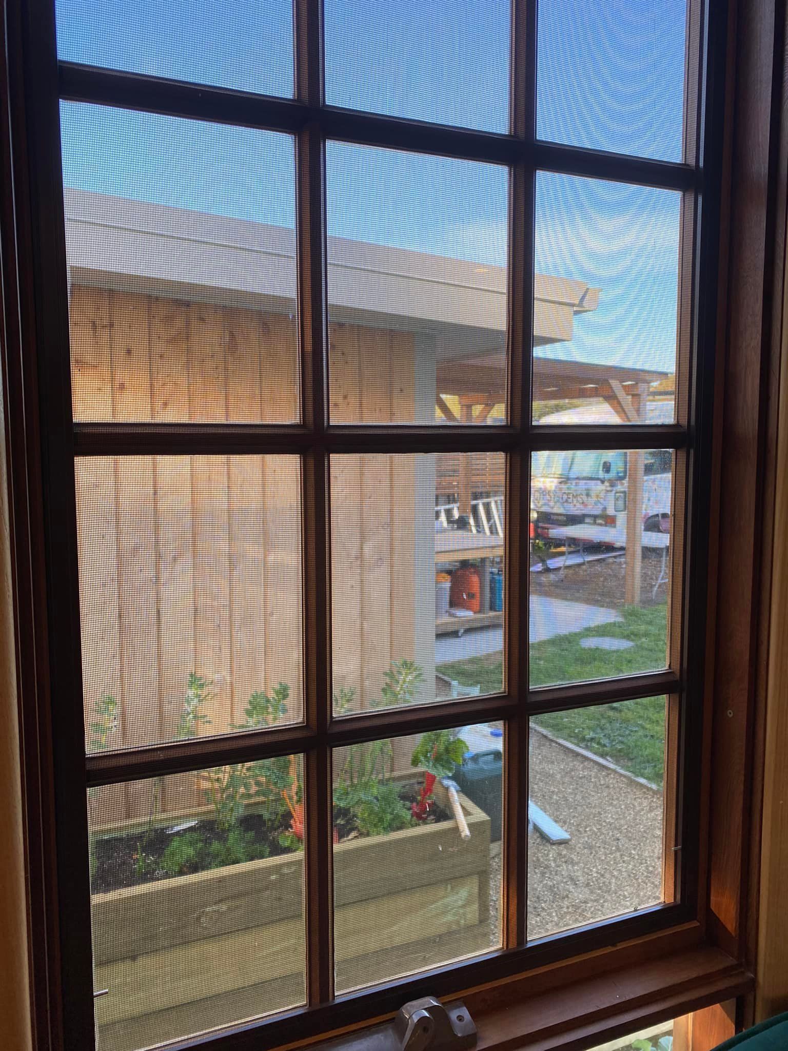 View Through a Panelled Window — Rodens Repairs Flyscreens and Doors In Forcett, TAS
