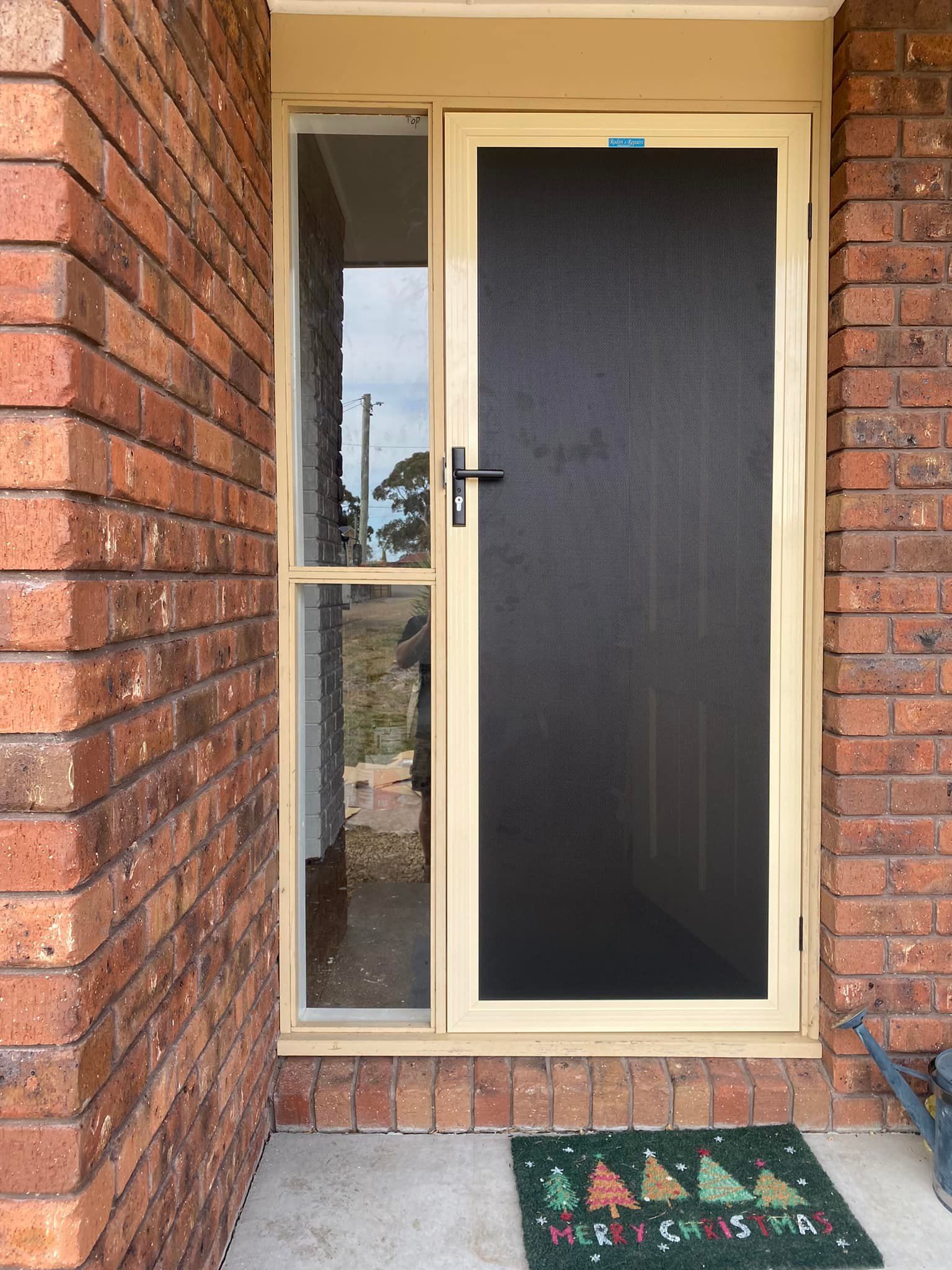 A Beige-framed Security Screen Door — Rodens Repairs Flyscreens and Doors In Forcett, TAS