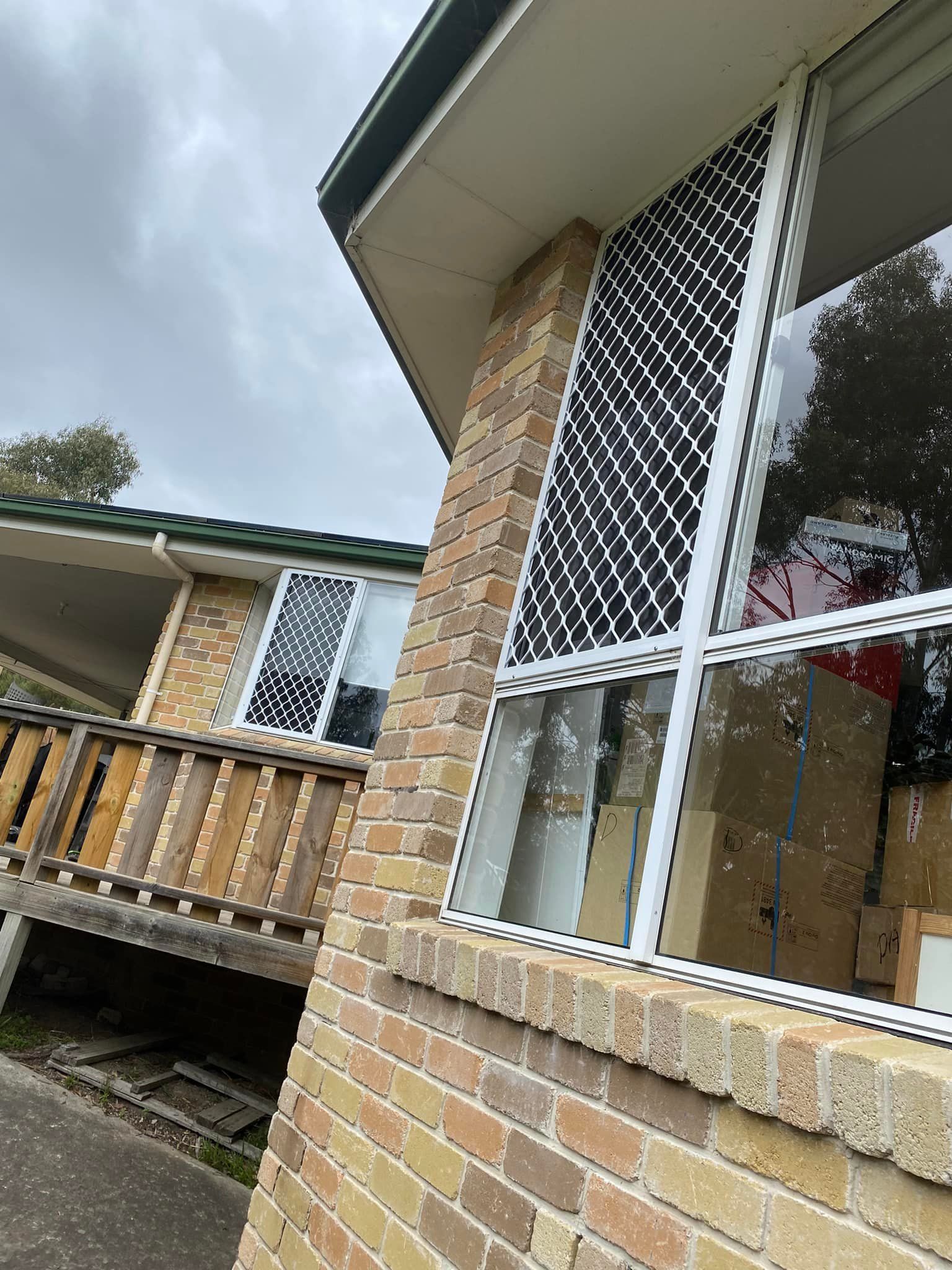 A Low-angle View of a Brick House Corner — Rodens Repairs Flyscreens and Doors In Forcett, TAS