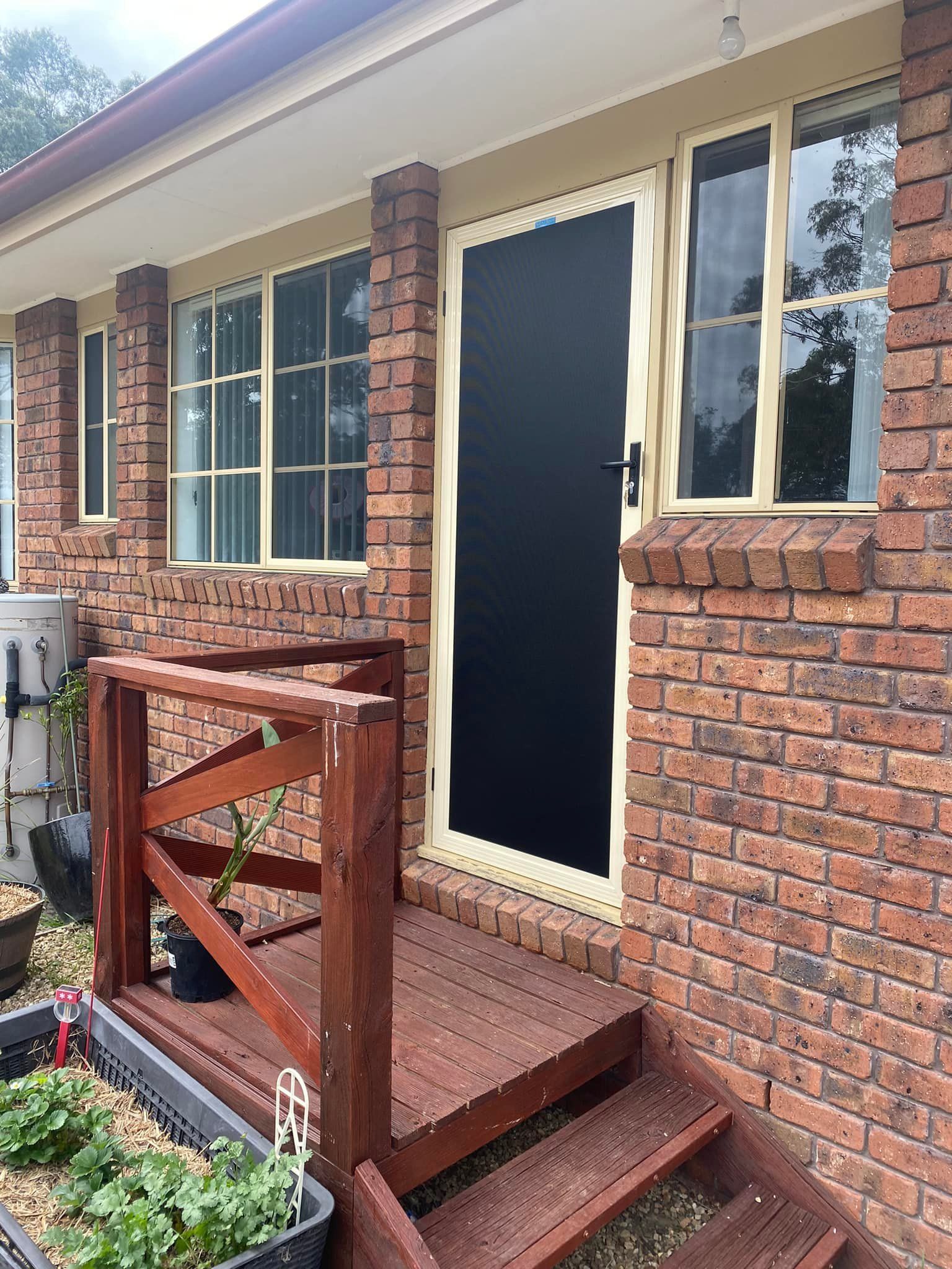 Exterior View of a Brick House — Rodens Repairs Flyscreens and Doors In Forcett, TAS
