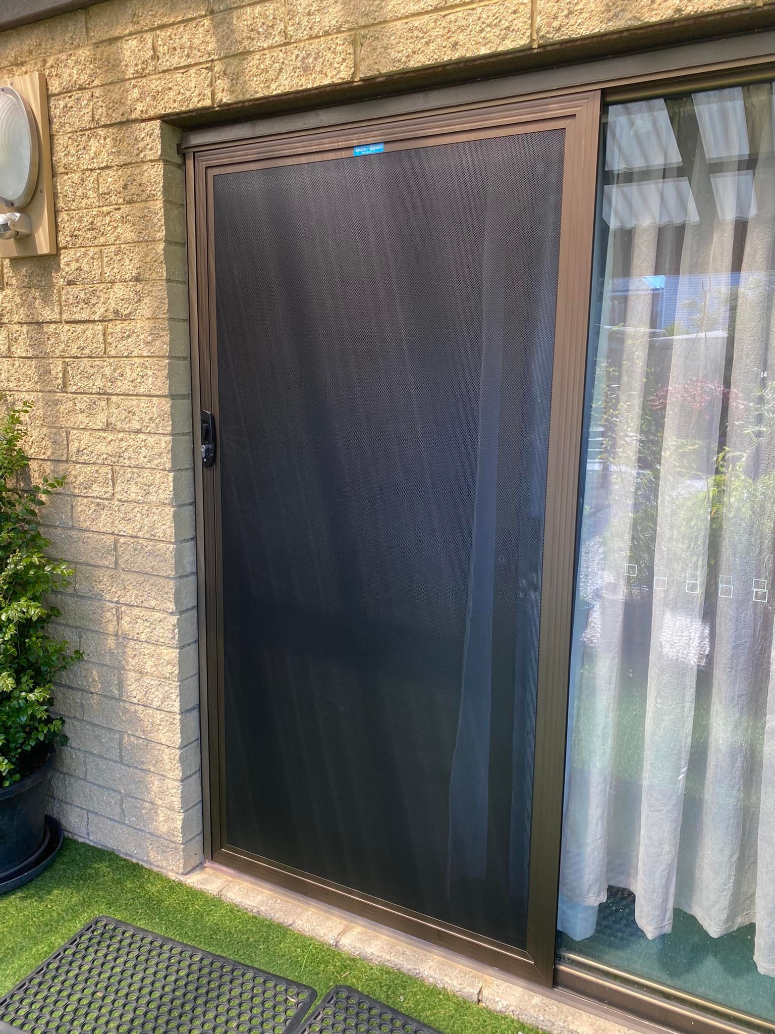 A Bronze-framed Security Screen Door — Rodens Repairs Flyscreens and Doors In Forcett, TAS
