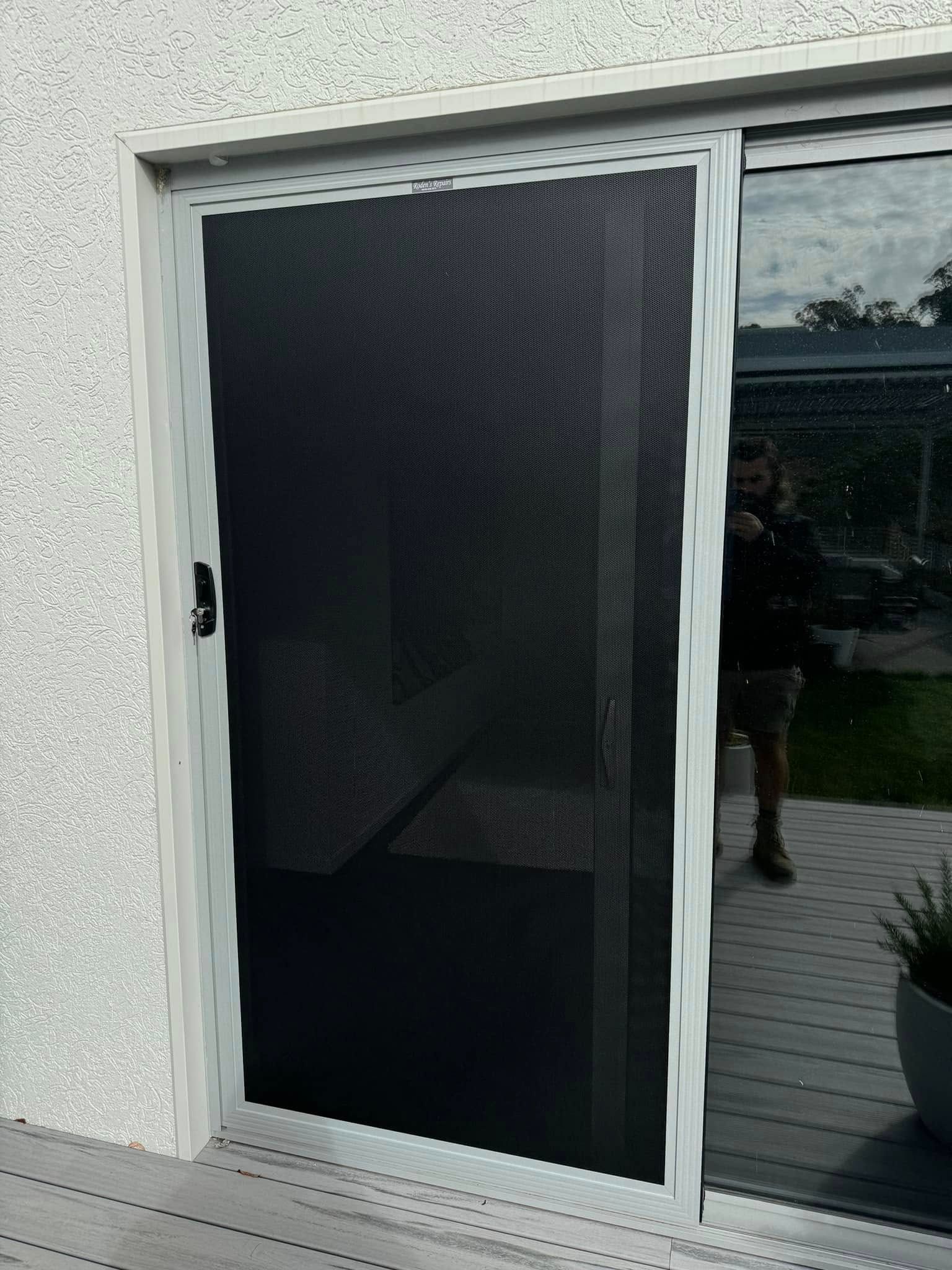 A Black Mesh Security Screen Door — Rodens Repairs Flyscreens and Doors In Forcett, TAS