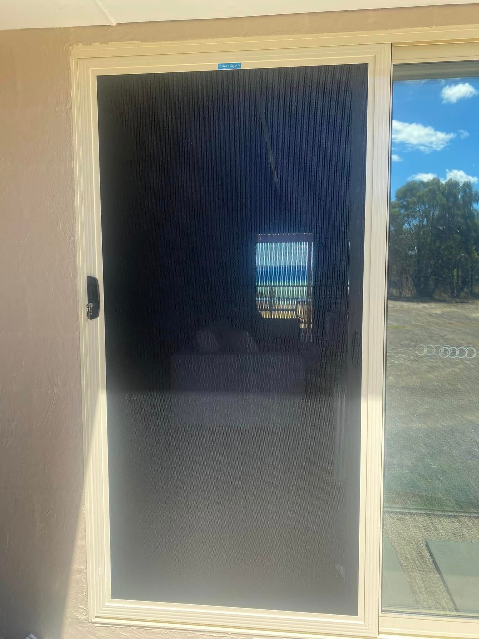 A Light-coloured Framed Screen Door — Rodens Repairs Flyscreens and Doors In Forcett, TAS