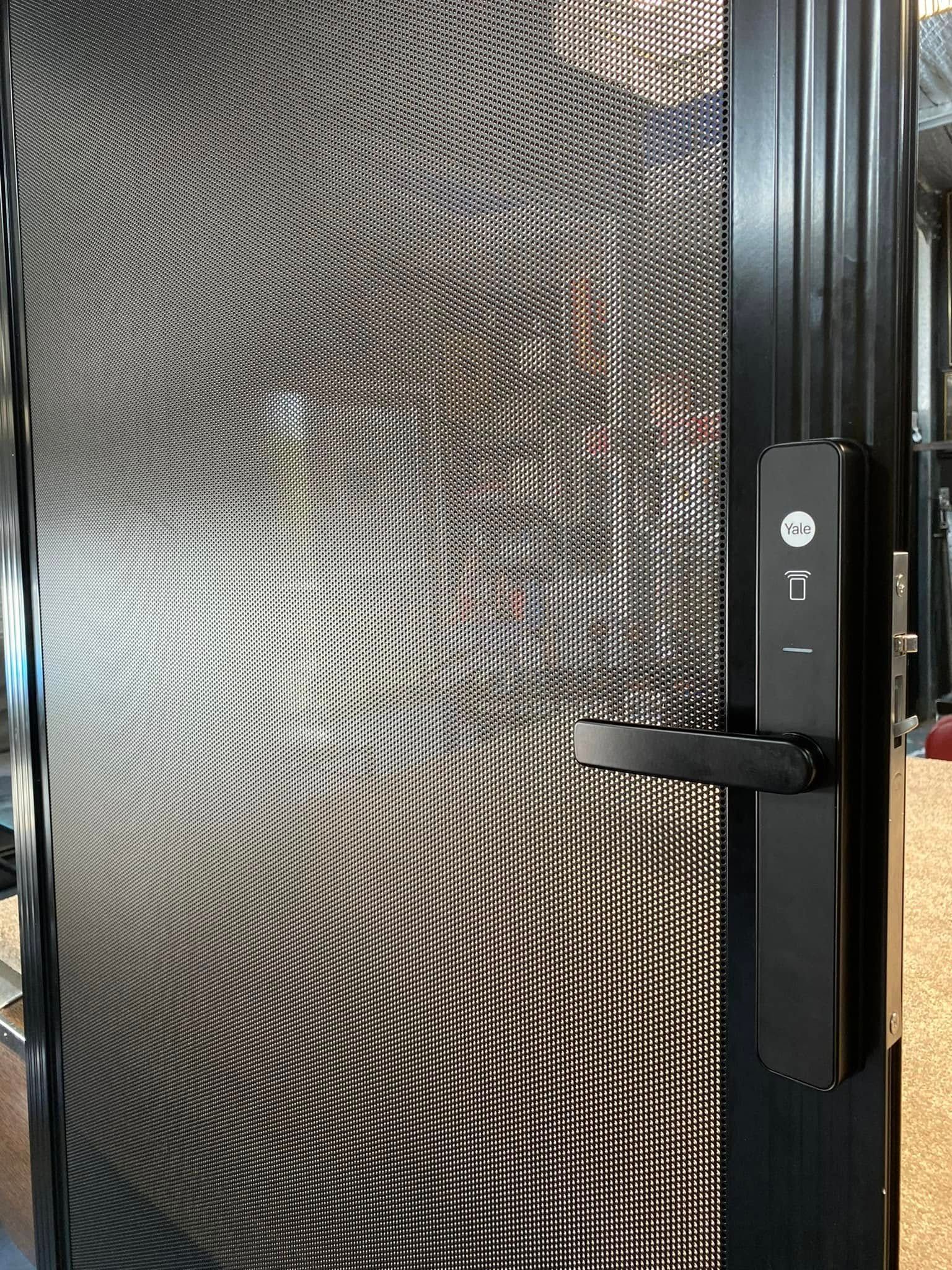 A Black Metal Security Screen Door — Rodens Repairs Flyscreens and Doors In Forcett, TAS