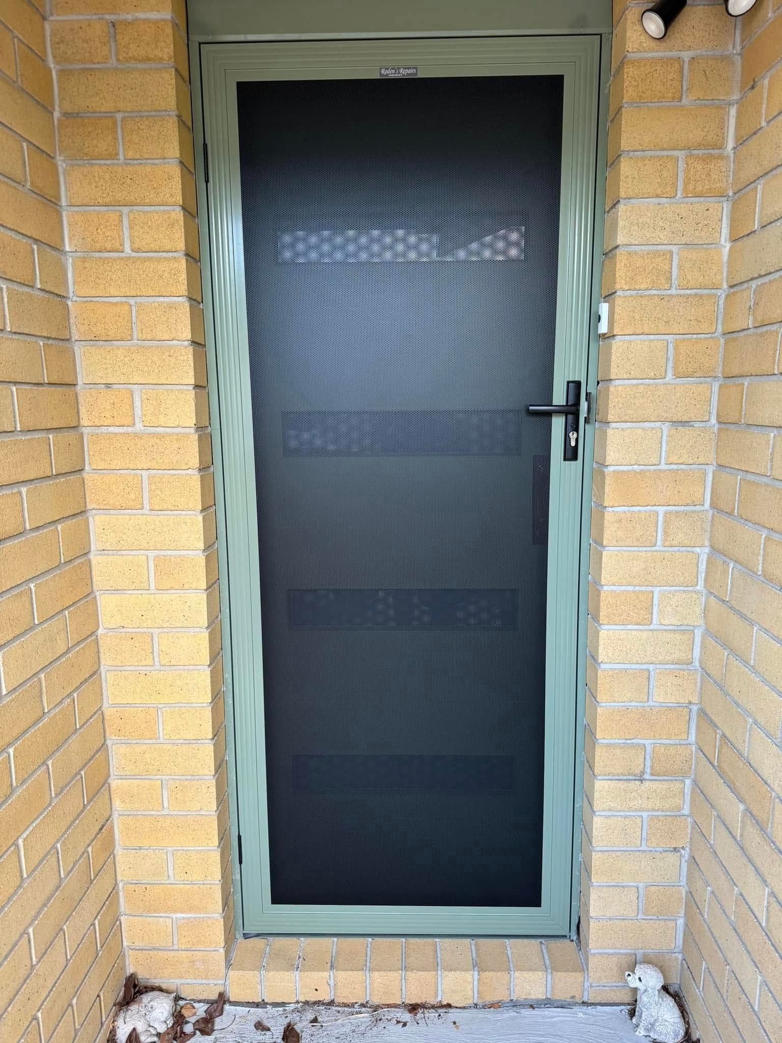 A Light Green Security Screen Door — Rodens Repairs Flyscreens and Doors In Forcett, TAS