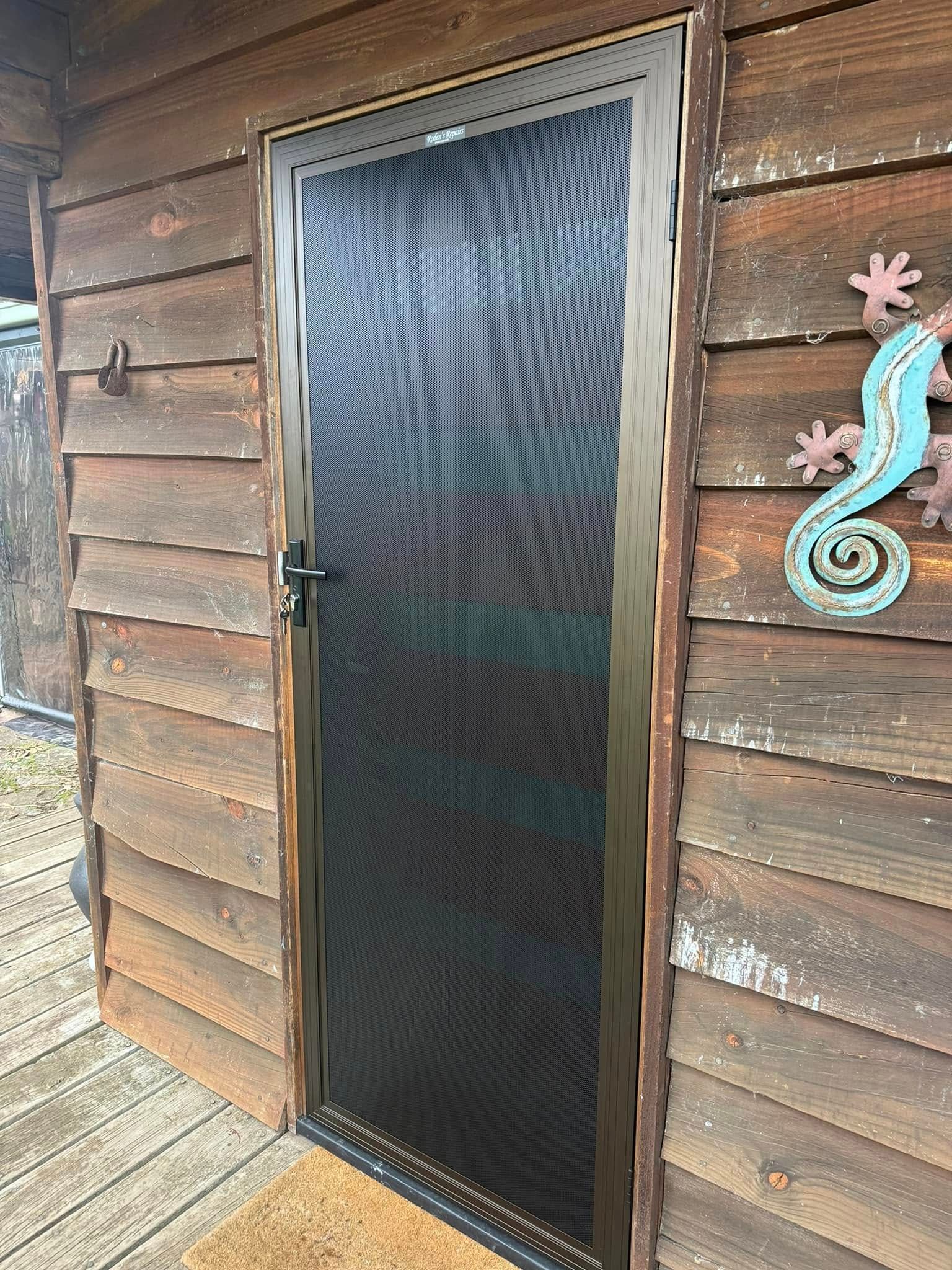A Brown Security Screen Door — Rodens Repairs Flyscreens and Doors In Forcett, TAS