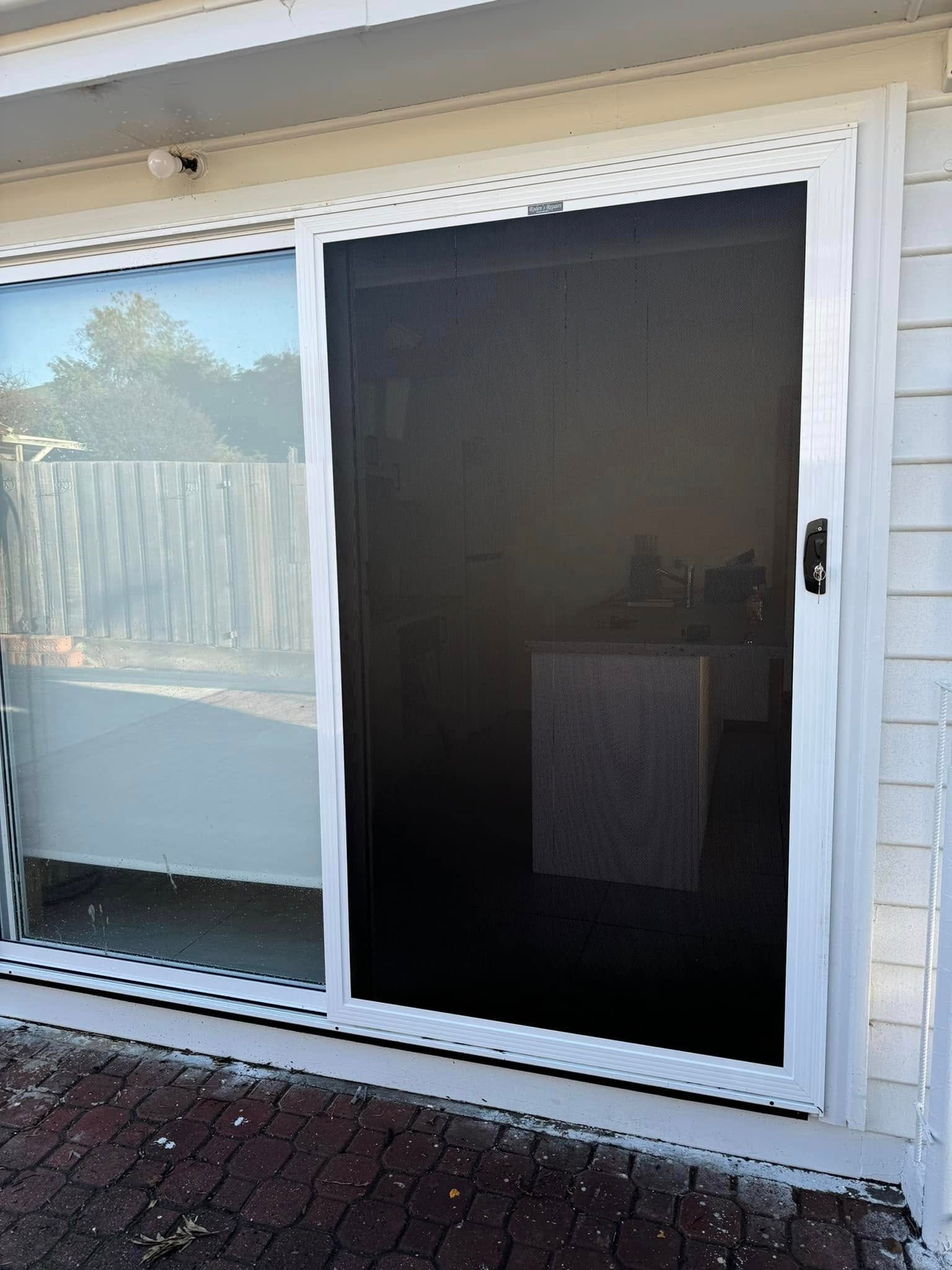 A White-framed Sliding Screen Door — Rodens Repairs Flyscreens and Doors In Forcett, TAS