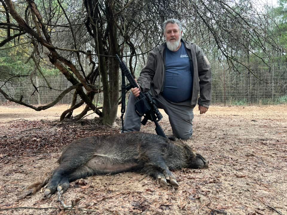 A Man Hunts a Wild Boar