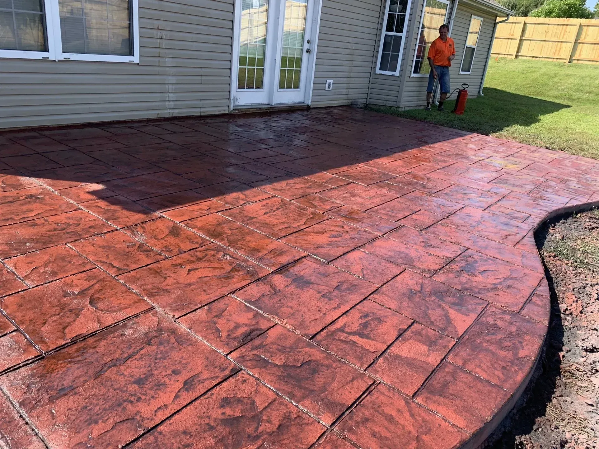 stamped and stained concrete back patio