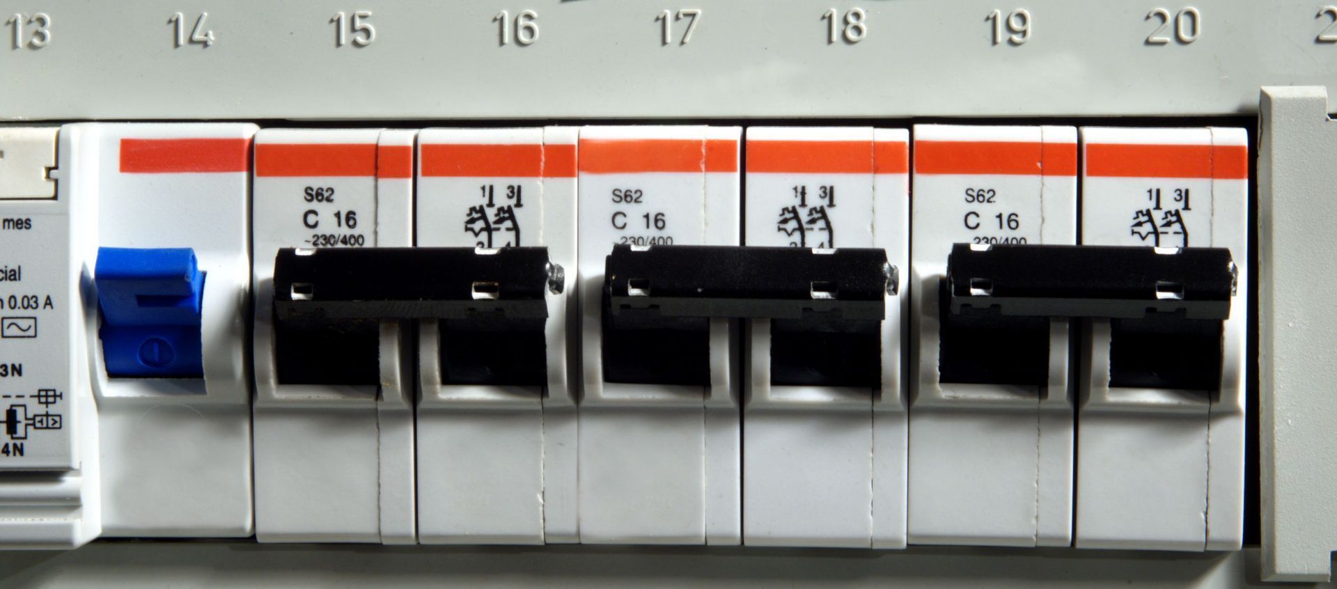 A close up of a circuit breaker with the number 13 on it