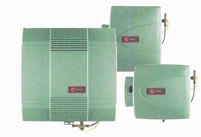 Evaporative humidifiers that are green with the logo Trane one them
