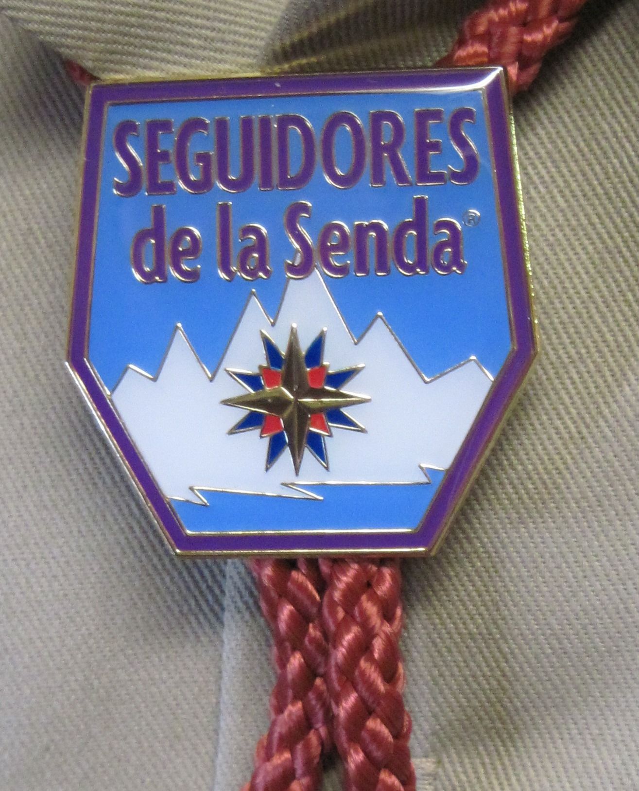 Corbata bolo del grupo Seguidores de la Senda