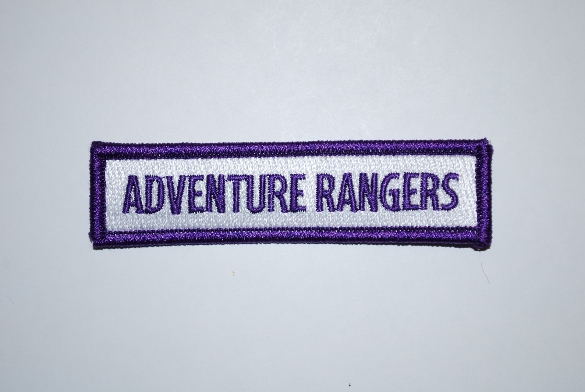 Tira con nombre de los Adventure Rangers