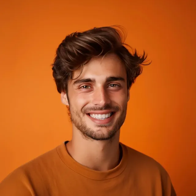 Smiling young man representing Invisalign and clear aligner treatment