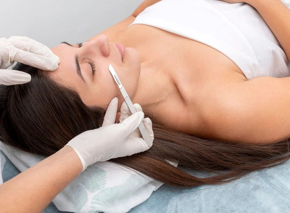 The Skin Studio providing a dermaplaning facial in their Nottingham Clinic