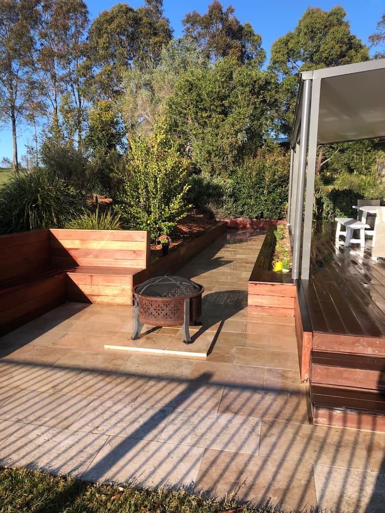There is a Fire Pit in the Middle of the Patio — Peter Phillips Landscape Design in Kangaroo Valley, NSW