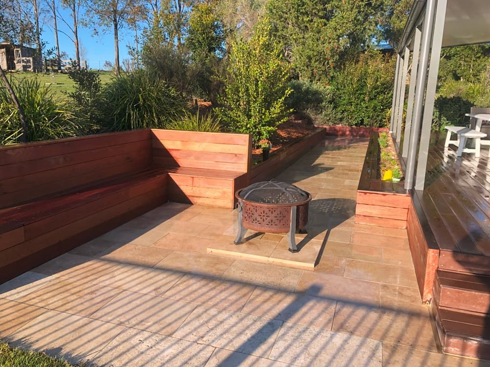 There is a Fire Pit in the Middle of the Patio — Peter Phillips Landscape Design in Bomaderry, NSW