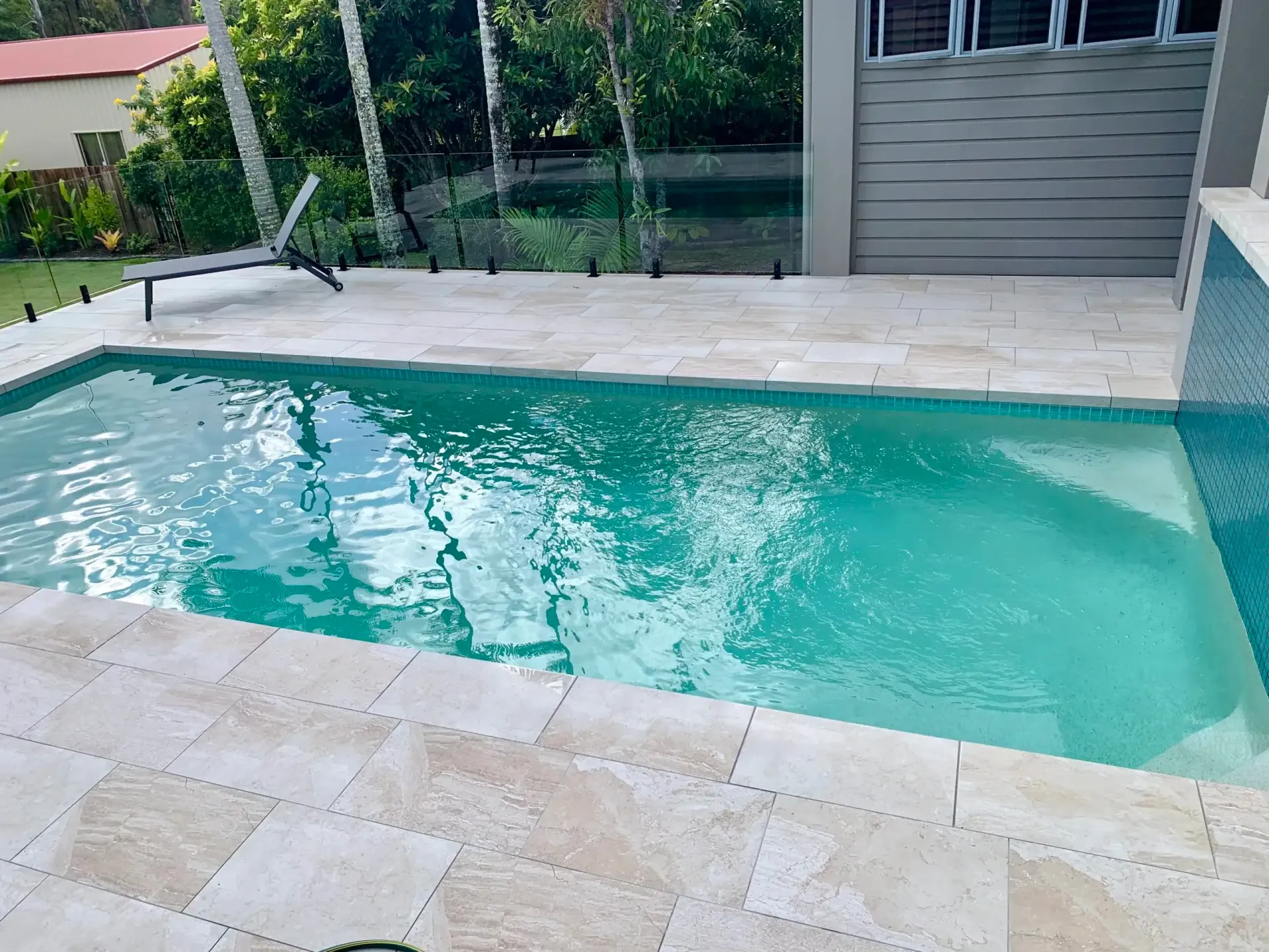 Rectangular Turquoise Swimming Pool — Mad Pool Interiors and Renovations in Baringa, QLD