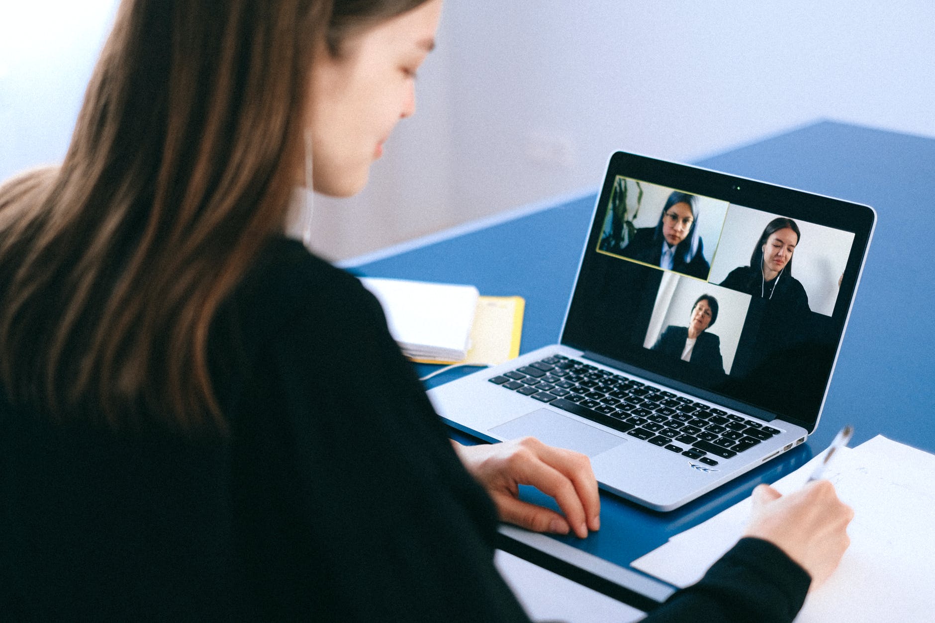 woman conducting online meetings