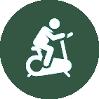 A man is riding an exercise bike in a green circle.